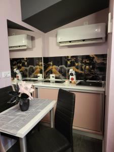 Køkken eller tekøkken på TABATA FITNESS Apartments DEVA