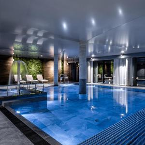 Πισίνα στο ή κοντά στο Wonder Hill - klimatyzowane apartamenty z bajkowym widokiem na góry i zalew oraz z dostępem do basenów i jacuzzi +53 φωτογραφίες