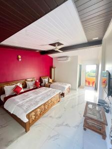 Μια τηλεόραση ή/και κέντρο ψυχαγωγίας στο Hotel Kadam Palace