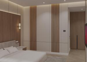 En eller flere senge i et værelse på Emir's Garden Boutique Hotel