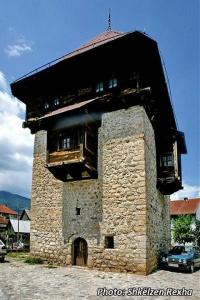 a building with a roof on top of it at Apartmani Alo Alo (kod Mikija) in Plav