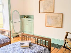 En eller flere senge i et værelse på Family Home in Tywyn - Game and Cinema Rooms + 45 billeder