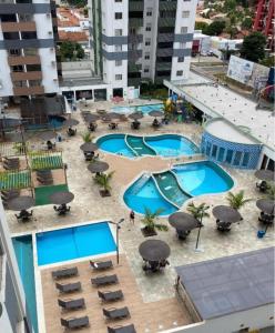 Swimmingpoolen hos eller tæt på Apartamento 1 quarto para 5 pessoas