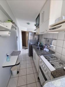 Køkken eller tekøkken på Apartamento 1 quarto para 5 pessoas