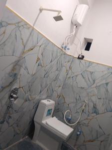 Koupelna v ubytování HOTEL TOWN INn