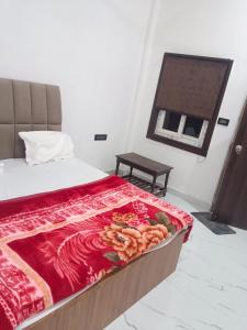 Postel nebo postele na pokoji v ubytování HOTEL TOWN INn