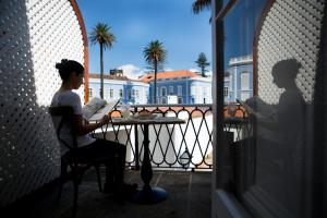 Een balkon of terras bij Casa das Palmeiras Charming House - Azores 1901