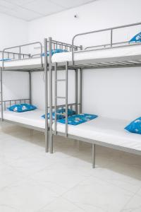 a rendering of a dorm room with bunk beds at Sikka Hostel in Muscat