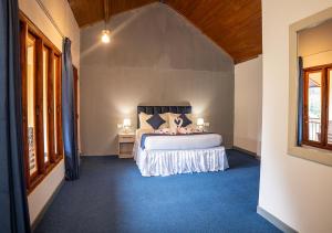 Postel nebo postele na pokoji v ubytování Wecay Holidays