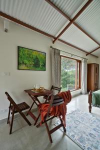 Et opholdsområde på SaffronStays Oakridge Cottage