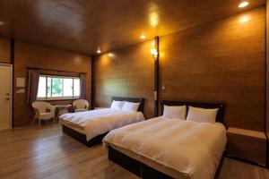 Llit o llits en una habitació de Kenting Dream House