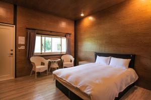 Llit o llits en una habitació de Kenting Dream House