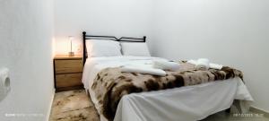 Postel nebo postele na pokoji v ubytování Αγιονέρι