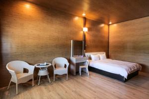 Llit o llits en una habitació de Kenting Dream House