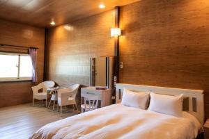 Llit o llits en una habitació de Kenting Dream House