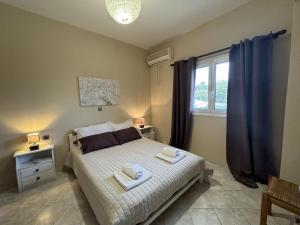 Postel nebo postele na pokoji v ubytování Georgia