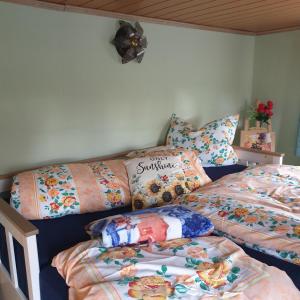 Giường trong phòng chung tại Ferienhaus Zum Kleintierzüchter