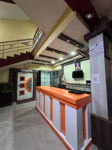 Nhà bếp/bếp nhỏ tại Hotel Lisa Galaxy