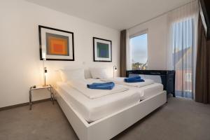 Postel nebo postele na pokoji v ubytování Haus KLIPPER Norderney