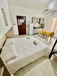 Kuchyň nebo kuchyňský kout v ubytování Affittacamere La bottega del barbiere