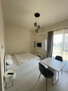 Postel nebo postele na pokoji v ubytování VISAJ Residence + 38 fotografií