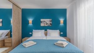 Ένα ή περισσότερα κρεβάτια σε δωμάτιο στο Family villa Corticum Otium with pool in Tinjan +73 φωτογραφίες