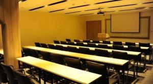 an empty classroom with desks and chairs and a chalkboard at Atour Hotel Xi'an High Tech Dazhai Road in Xi'an