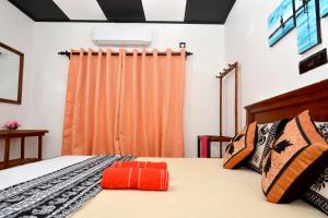 Postel nebo postele na pokoji v ubytování Royal Residence Negombo + 11 fotografií