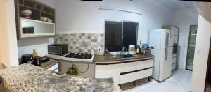 Фотография из галереи Casa com piscina e área kids в городе Серра