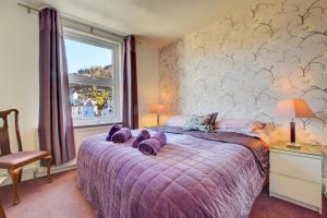 En eller flere senge i et værelse på 3 Bed in Dartmouth oc-bc21