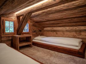 Ένα ή περισσότερα κρεβάτια σε δωμάτιο στο Chalet with fireplace and sauna