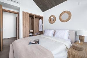 En eller flere senge i et værelse på Pamboo TerraVine House by Nomads