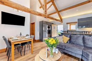 a living room with a couch and a table at 2 Bed in Bala oc-82212 in Bala +19 photos