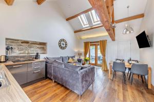 a living room with a couch and a table at 2 Bed in Bala oc-82212 in Bala