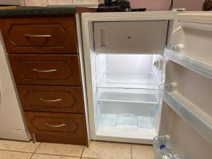 Køkken eller tekøkken på KTELI Sleep & Chill Apartment