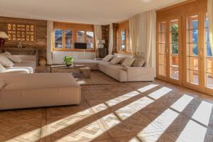 Posezení v ubytování Orion - Luxuriöse Duplex Wohnung in Grindelwald