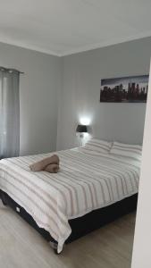 Postel nebo postele na pokoji v ubytování Lagoon Hide Out