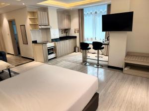 Kuchyň nebo kuchyňský kout v ubytování Bentark Hotel + 30 fotografií