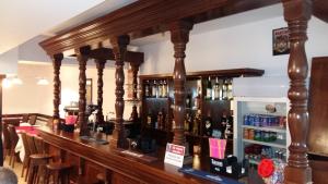 Nápoje v ubytování PENSIUNEA CARAIMAN Servicii de cazare + 8 fotografií