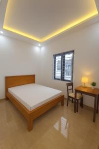 En eller flere senge i et værelse på Full house for foreigners for rent