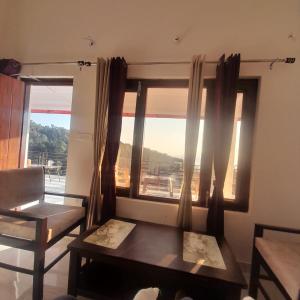 Et opholdsområde på Apple Hilltop Homestay