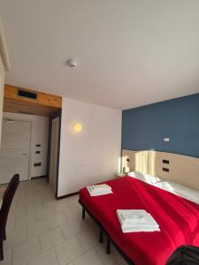 Postel nebo postele na pokoji v ubytování The Park Hotel