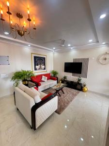 Et opholdsområde på Goldstone - Kudrat's Nilaya with pool