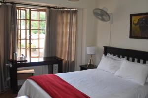 Postel nebo postele na pokoji v ubytování Siesta B&B