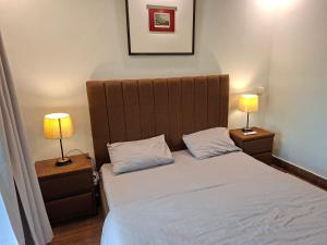 Кровать или кровати в номере Private Suite - Park Towers F-10 Markaz