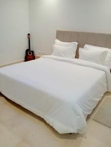 Postel nebo postele na pokoji v ubytování Joli Appartement Superieur