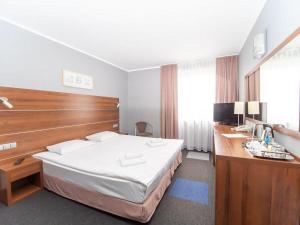 Postel nebo postele na pokoji v ubytování B&B HOTEL Tychy
