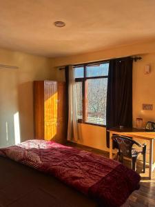 Ένα ή περισσότερα κρεβάτια σε δωμάτιο στο Himalayan Heist +3 φωτογραφίες