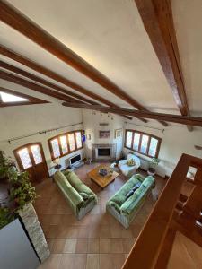 an overhead view of a living room with couches and a table at Villa La Giulia in Cerveteri