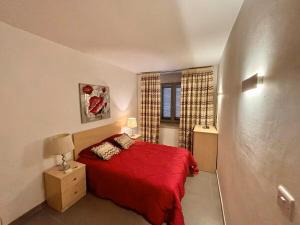 En eller flere senge i et værelse på Birgu Seafront 3 Bedroom Apartment